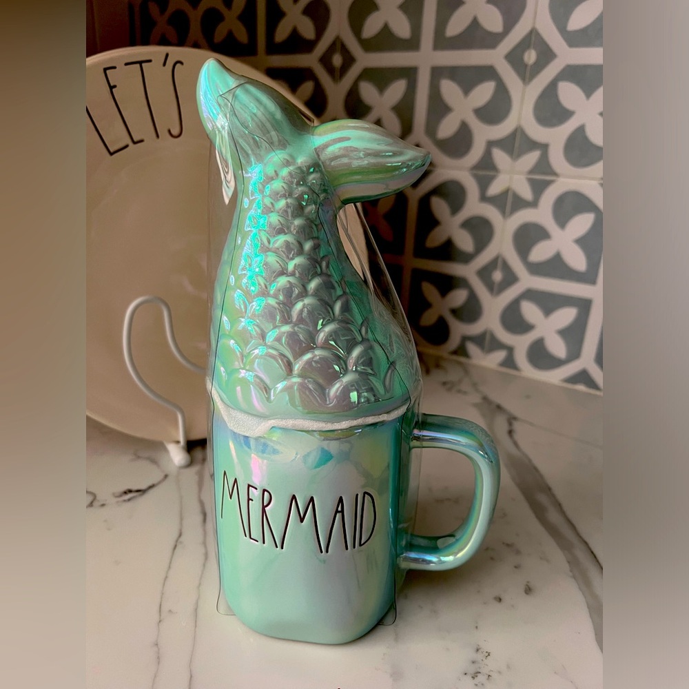 Pretty Mermaid mug with mermaid tale topper brand new never used.